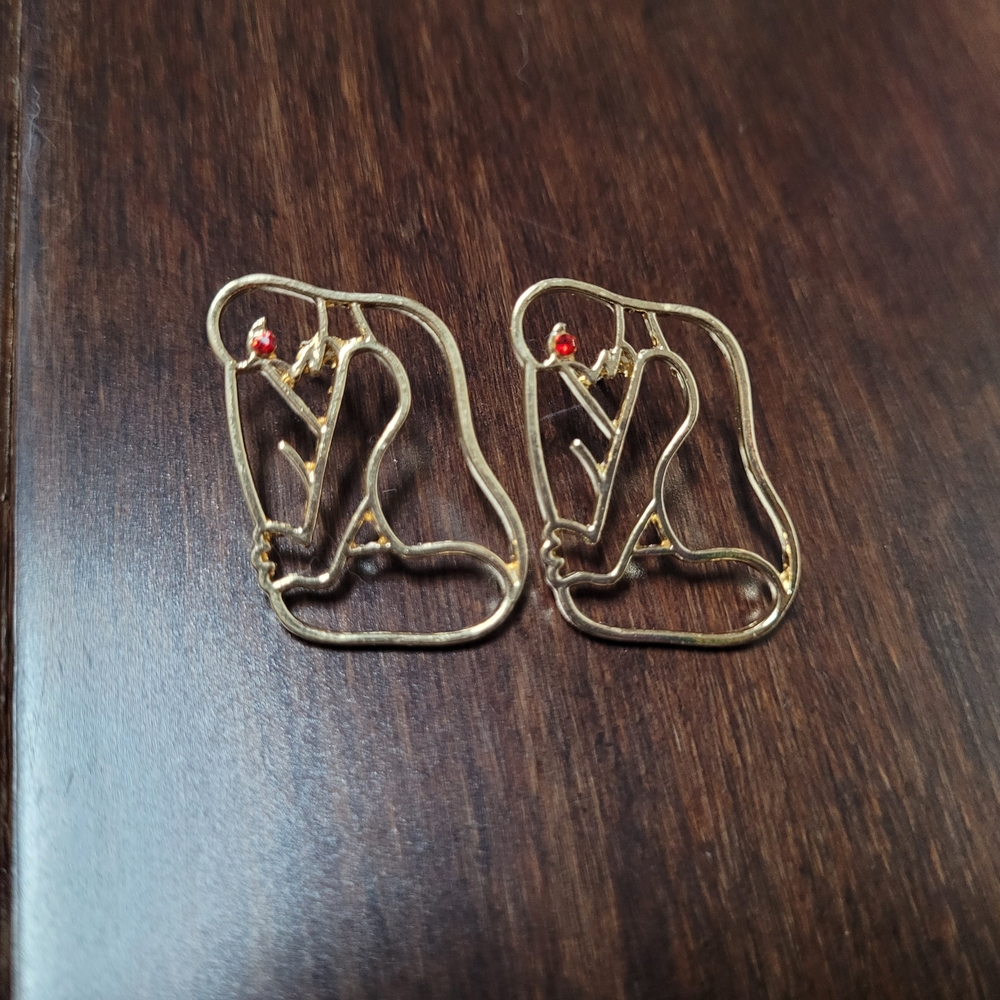 Elegant Gold Earrings with Red Accent